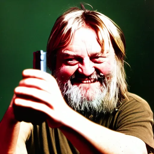 Prompt: laughing robert wyatt pointing a gun at the camera