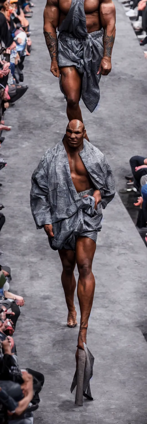 Image similar to hyperrealistic and heavy detailed 2321s runway show of mike tyson , Leica SL2 50mm, vivid color, high quality, high textured