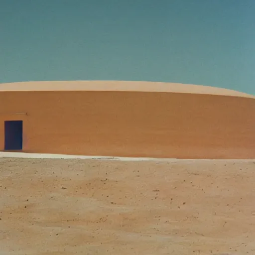 Prompt: a Non-Euclidean orb-like clay house sitting in the desert, vintage photo, beautiful cinematography, blue sky, film grain, James Turrell