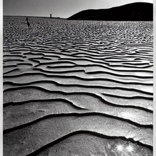 Prompt: Ripples in Spacetime by Lucien Clergue