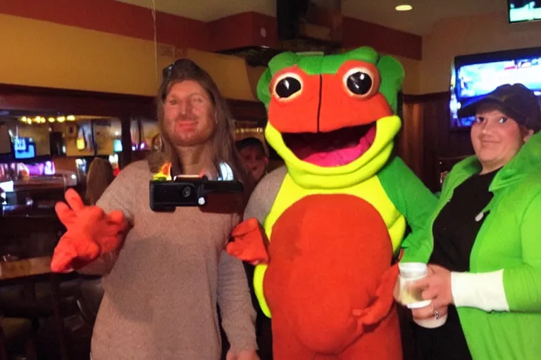 Image similar to taking a selfie with a frog fleshy mascot costume at an applebee's, cell phone photo
