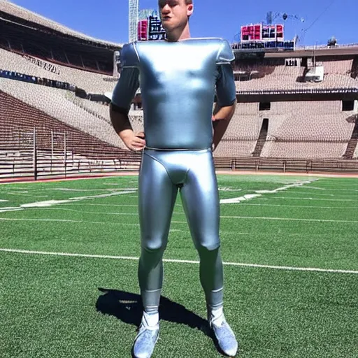 Image similar to “ a realistic detailed photo of a guy who is an attractive humanoid who is half robot and half humanoid, who is a male android, football player christian mccaffrey, shiny skin, posing like a statue, blank stare, on the field, on display ”