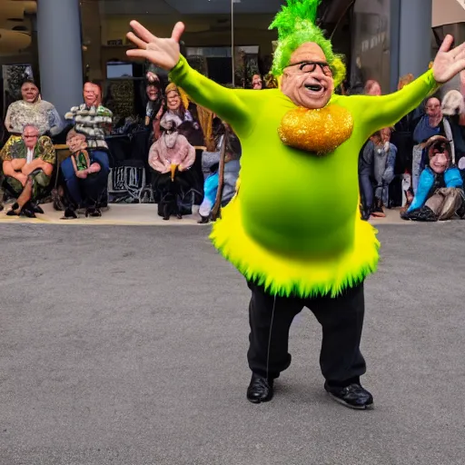 Image similar to Danny Devito dancing while wearing a pickle costume, photorealistic, fine detail, portrait, 8k hdr, photo