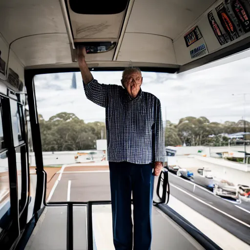 Image similar to a elderly man standing on top of a transperth bus, canon eos r 3, f / 1. 4, iso 2 0 0, 1 / 1 6 0 s, 8 k, raw, unedited, symmetrical balance, wide angle