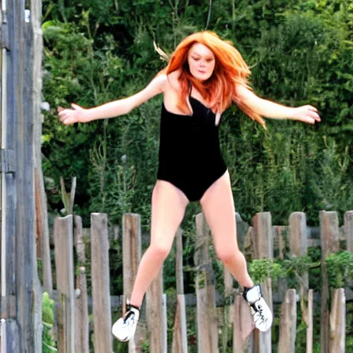 Image similar to Lindsay Lohan jumping over a small fence