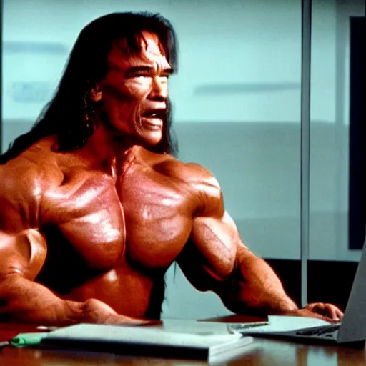 Image similar to arnold schwarzenegger as conan the barbarian sitting at a desk, as an office worker, in an office, inside an office building, sitting at a desk, angrily shouting and pointing at a laptop, laptop computer, crisp lighting, corporate photography