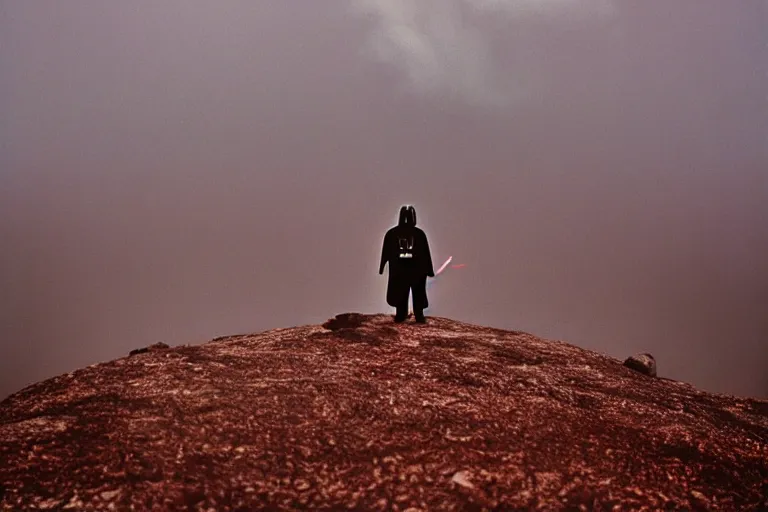 Image similar to darth vader on top of a tall mountain, blue fog, tornadoes surrounding, film photography, soft lighting, vignette