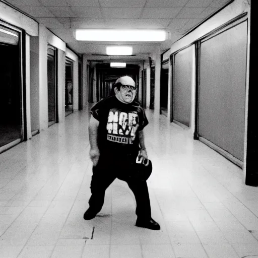 Image similar to A creepy photo of Danny Devito chasing you in an abandoned shopping mall, disposable film