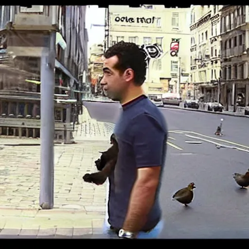 Image similar to surveillance camera footage of xavi hernandez on the street holding a pigeon