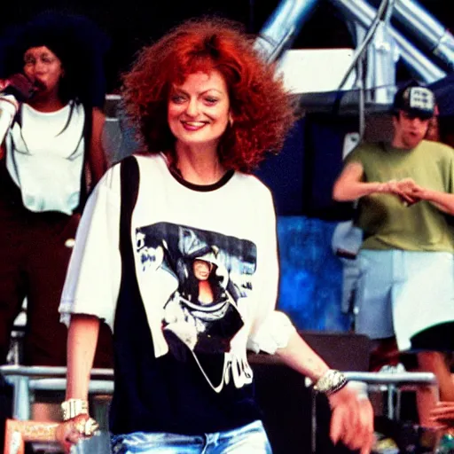 Image similar to 1 9 9 0 s video still of susan sarandon, wearing hip hop urban clothing, rapping on stage at a small outdoor concert, vhs artifacts