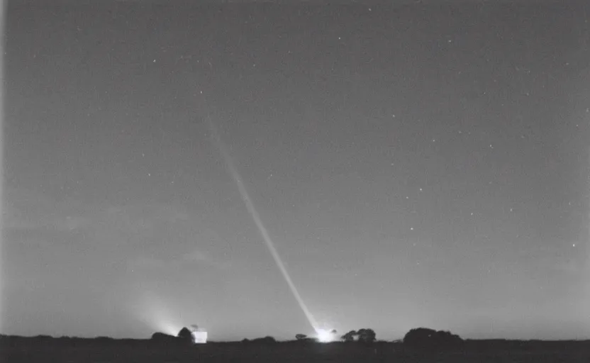 Image similar to red beam of light from lighthouse rotating over the field, night, unsettling, fire on the horizon, photo 1998