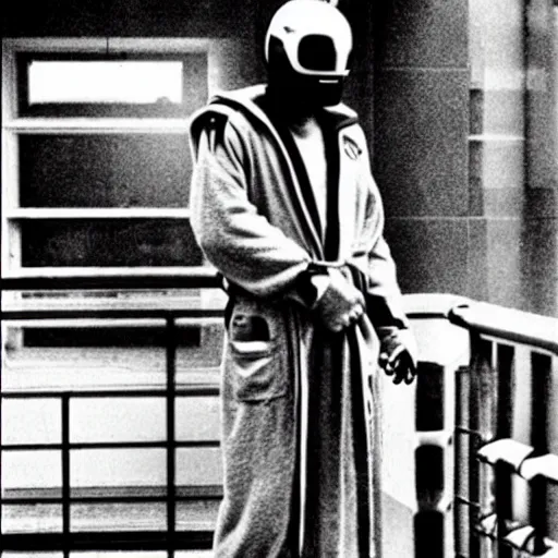 Prompt: a paparazzi photography of robocop wearing a bathrobe smoking a cigarette, standing on a balcony