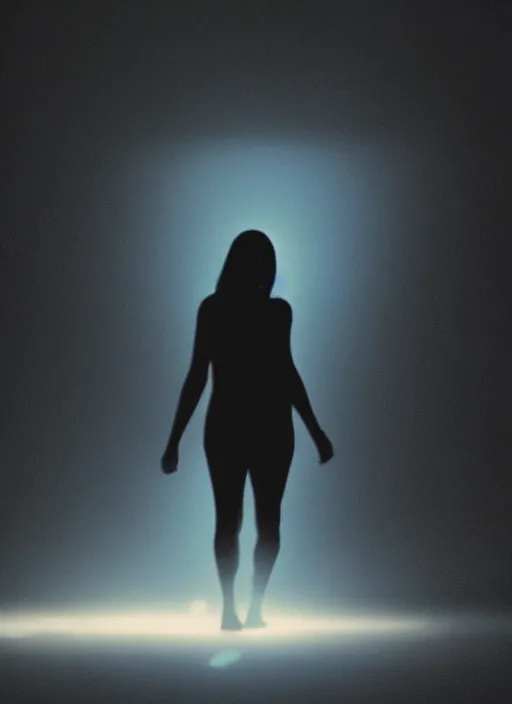 Image similar to a thin female silhouette walking, astral projection, blue glowing aura, out of body, film grain, cinematic lighting