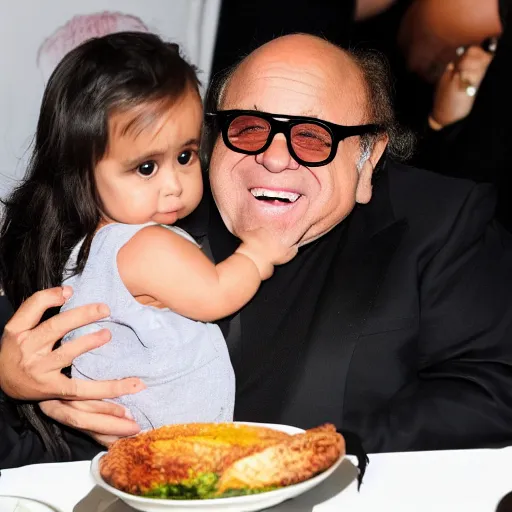 Image similar to danny devito is a very small little baby and kim kardashian is feeding danny devito from a bottle