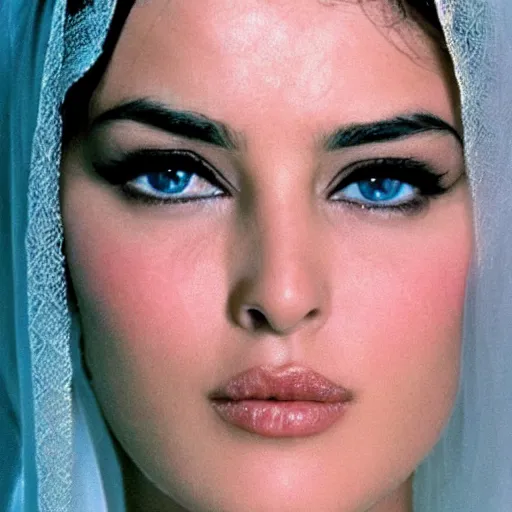 Prompt: young arab Monica Bellucci, blue eyes, white veil, closeup, focus, light makeup