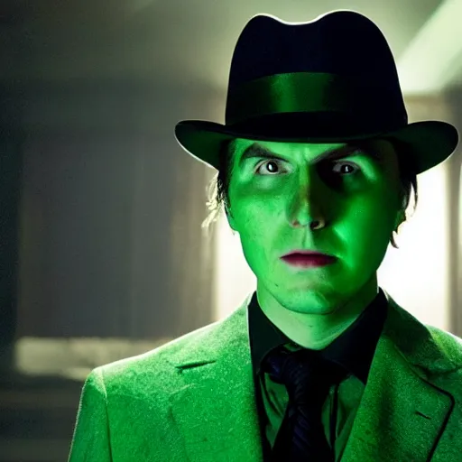 Image similar to film still of Paul Dano as Riddler in a green suit and tie and green fedora in The Batman, 4k, dark lighting, film noir, grainy, dark tone