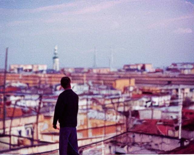 Image similar to lomo photo of man standing on the roof of soviet hrushevka in small town zelenograd, cinestill, bokeh, out of focus