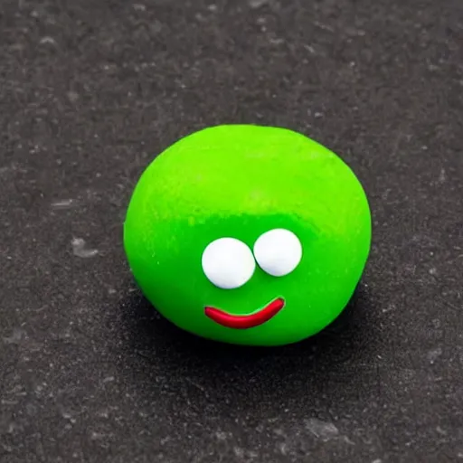 Image similar to photo of the green m & m with the face of borat