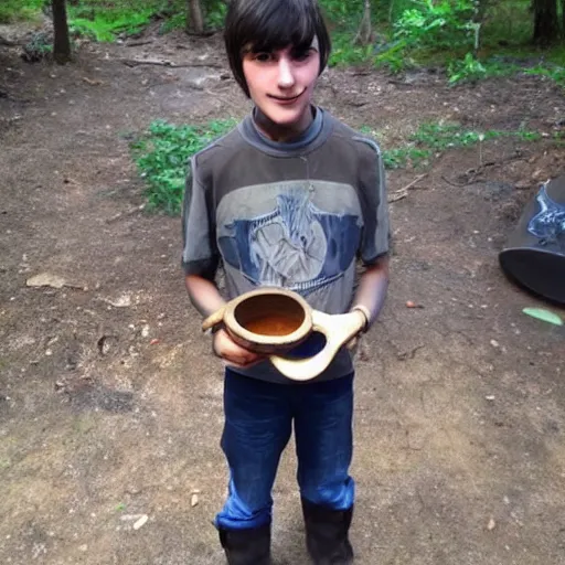 Prompt: 13 year old boy holding a crucible from doom, realistic cool.