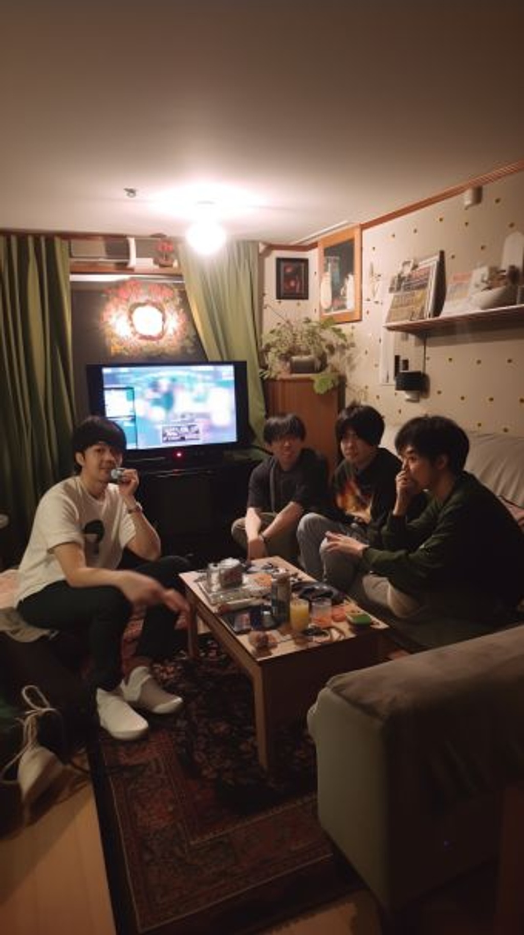 Prompt: scene set in a 90s living room :: 5, where a group of friends :: 4 are sitting in a 90s-themed living room :: 4. They are gathered around an old large standard TV :: 3 playing a badly-pixeled wrestling game :: 4 while enjoying pizza :: 3 and having a good time :: 4 --ar 9:16 --q 2 --upbeta --v 5