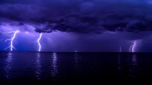 Prompt: the sea was calm, the sky was dark bluish purple, and there were thunderstorms, and it was calming
