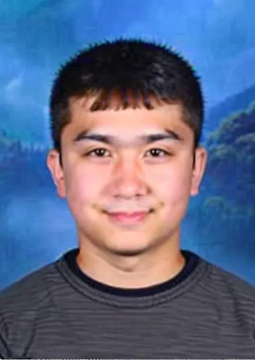 Prompt: "Make my ID photo look handsome, change the background to a forest, and use a realistic style."