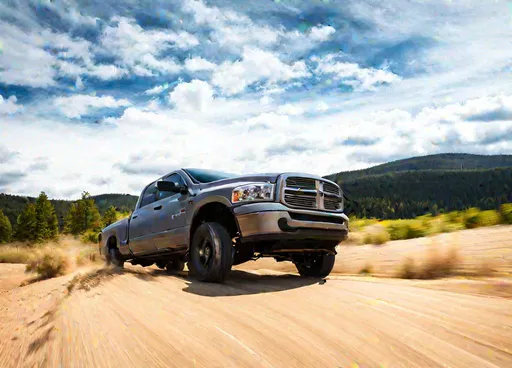 Prompt: long shot scenic professional photograph of a gray 2007 Dodge Ram truck. Pocono Mountains. Perfect point of view, highly detailed, wide-angle lens, hyper realistic, with dramatic sky, polarizing filter, natural lighting, vivid colors, everything in sharp focus, HDR, UHD, 64K.