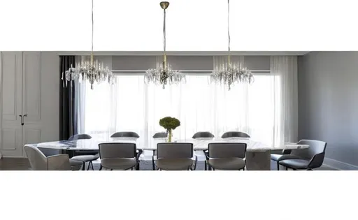 Prompt: Add 2 chandeliers over dining table.
contemporary look with dining table in marble  top