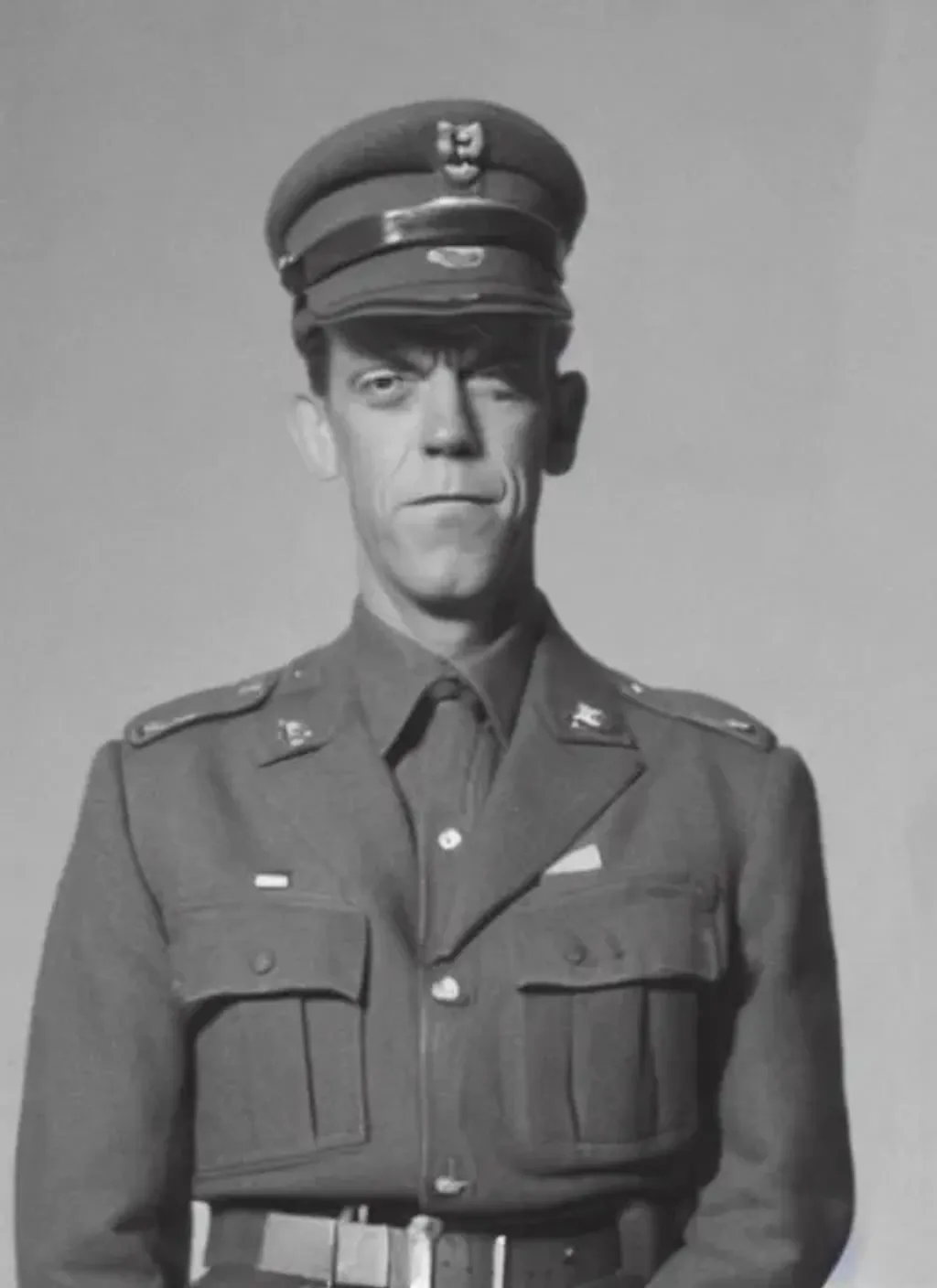 Prompt: Photograph of Hugh Laurie as a soldier in World War II, black and white